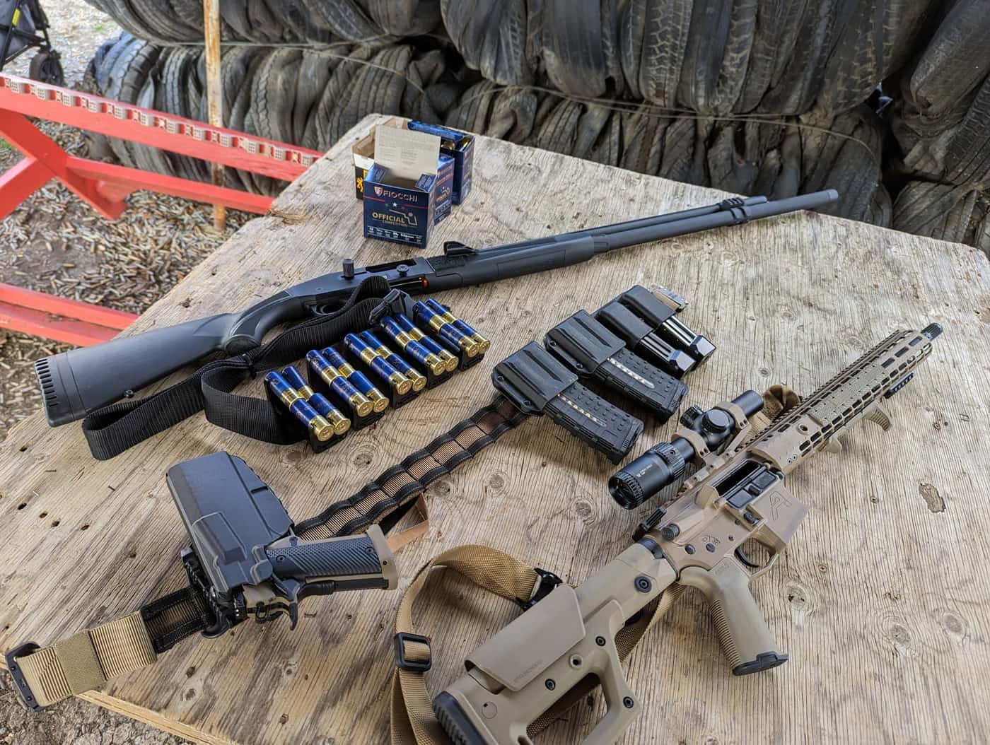 Competition belt with a 2011-pattern pistol in an open-front holster and magazine pouches