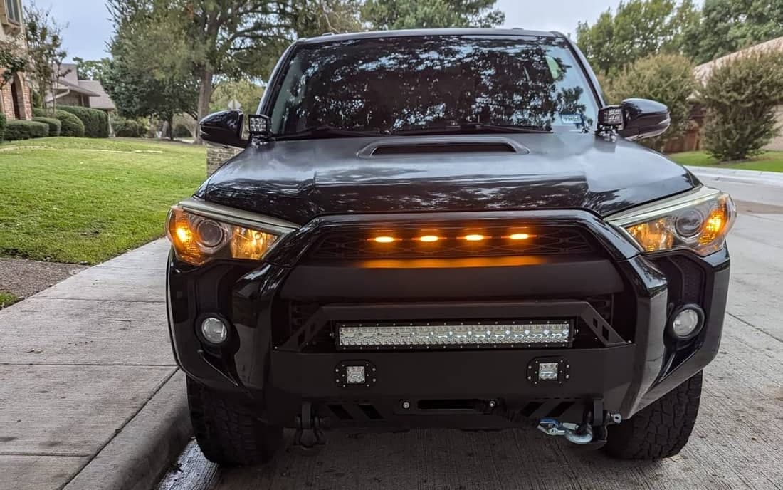 The 4Runner head-on with the steel front bumper, winch and bumper light bar fitted